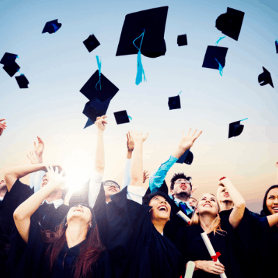 college grads throwing caps