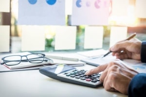 Business Finance Man Calculating Budget Numbers Invoices And Financial Adviser Working