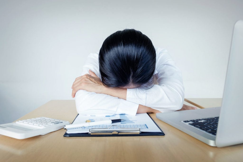 Office Business Technology Finances And Internet Concept Stressed Business Woman With Laptop Computer And Documents At Office