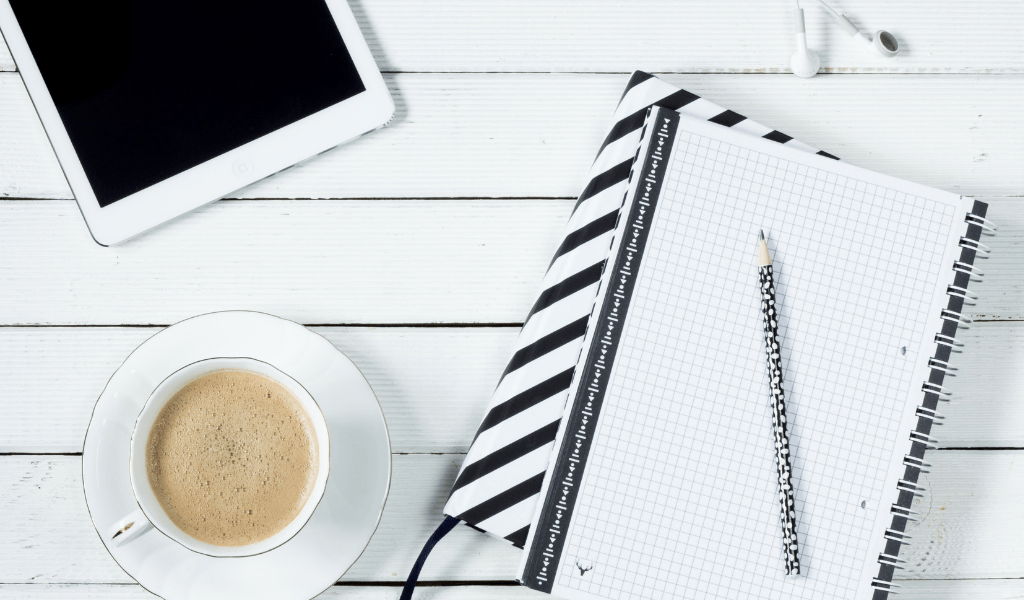 white desk and planner