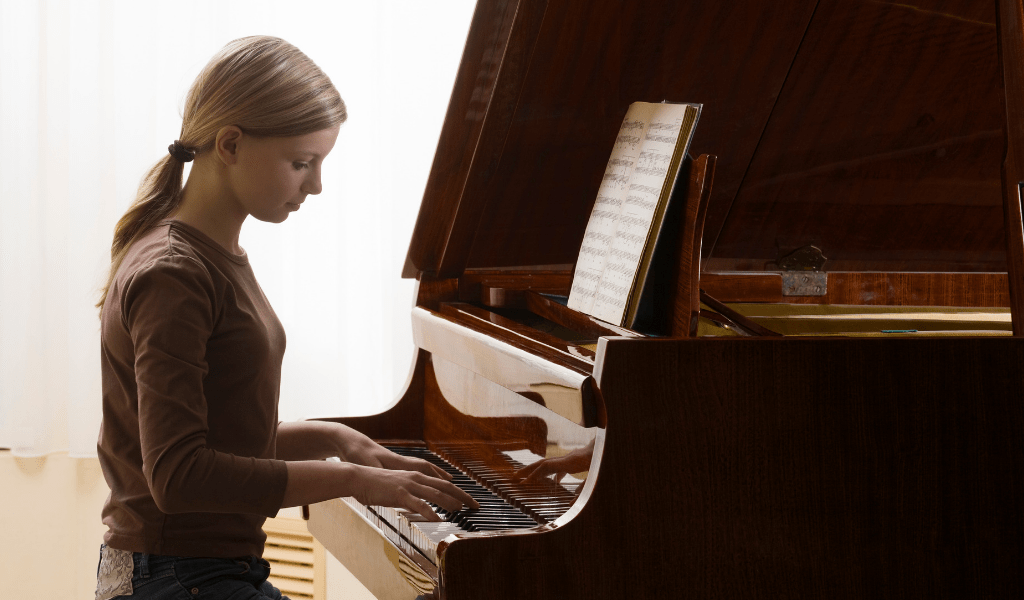 girl playing piano