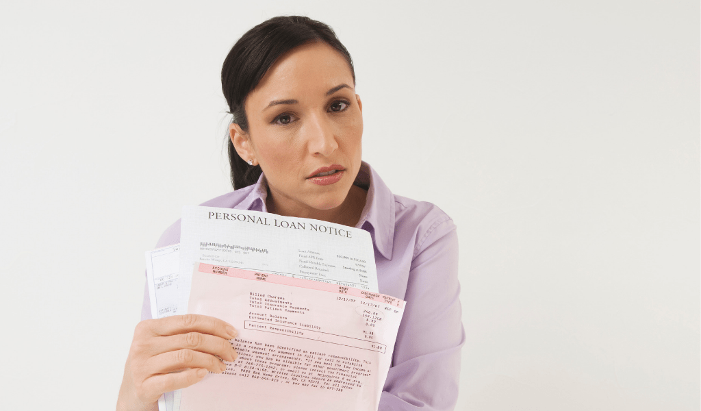 woman holding bills 