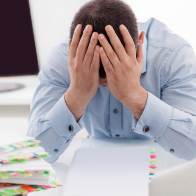 man upset about bad investments