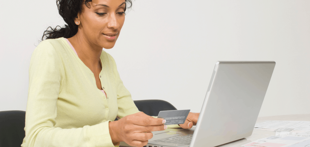 woman paying collections online with a credit card