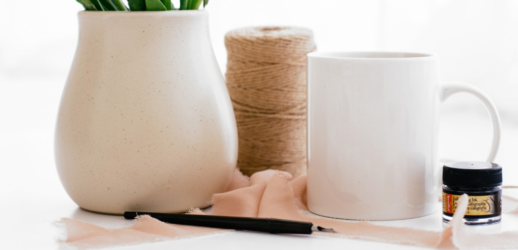 white vase and coffee mug