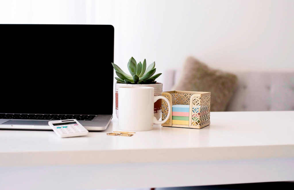 white desk with laptop