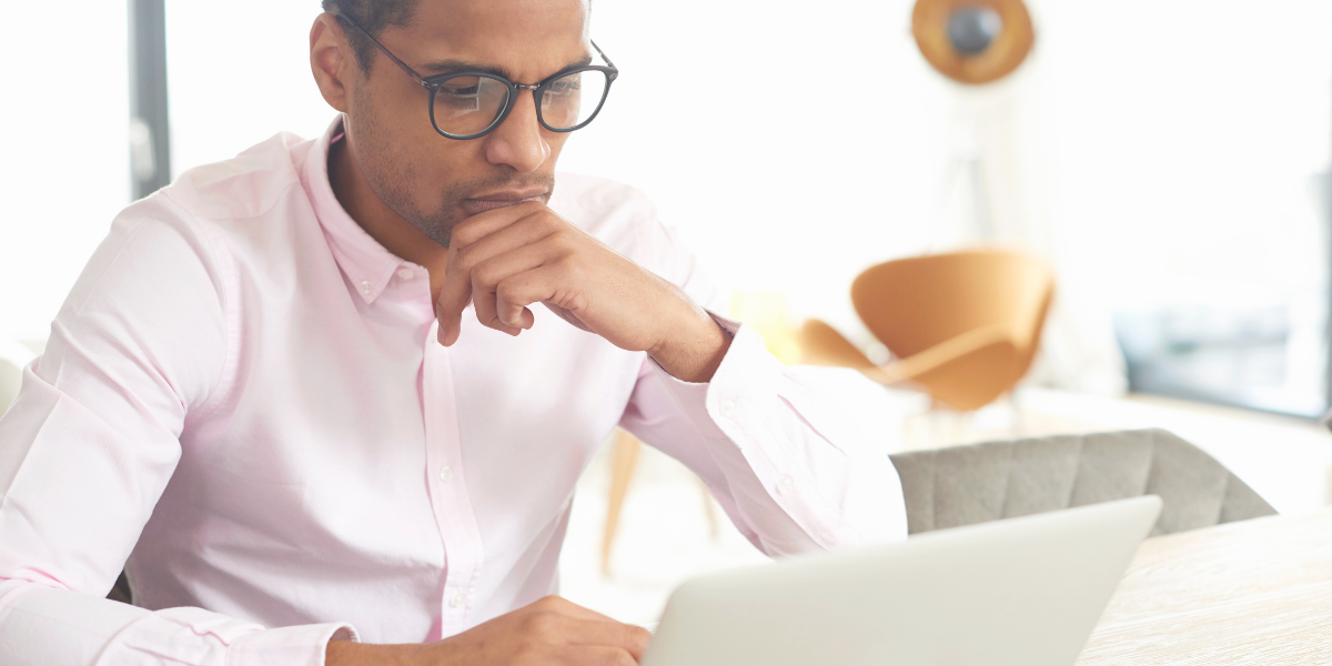 Black male working on laptop