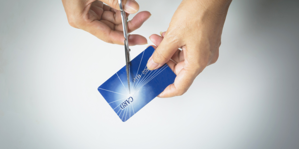 Cutting up credit cards and slashing expenses when you change your money mindset to secure your future and finances. 