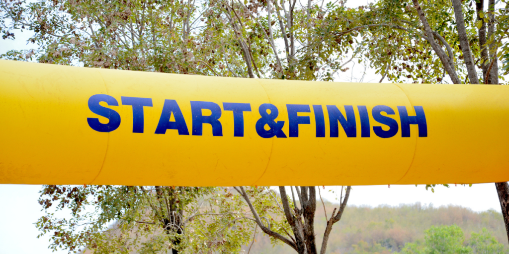 A yellow start & finish line for changing money mindset and securing a financial future. 