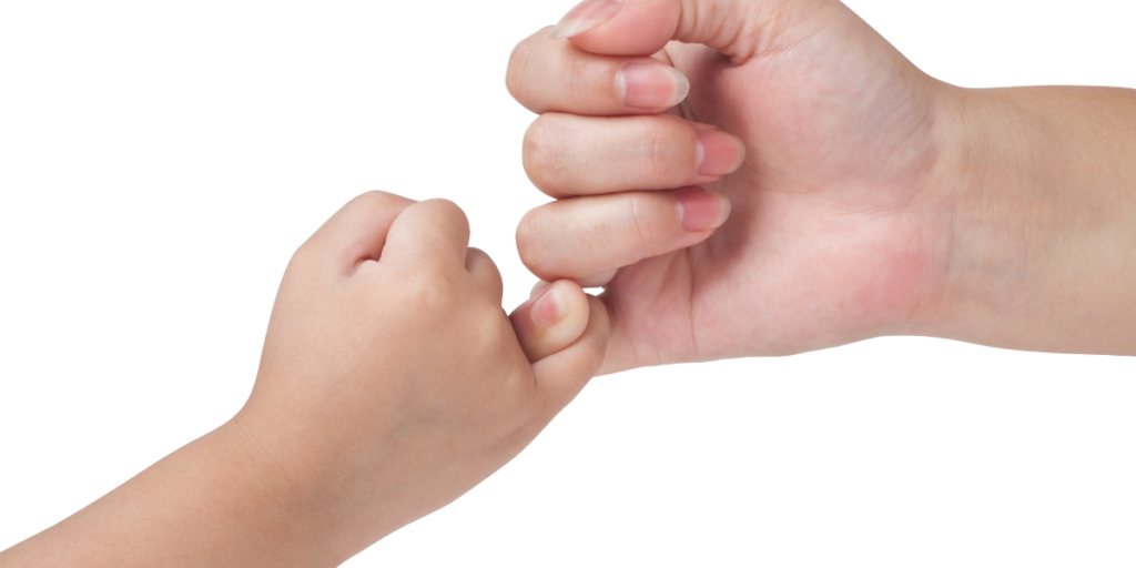 Two people pinkie promising to stick to a budget. 