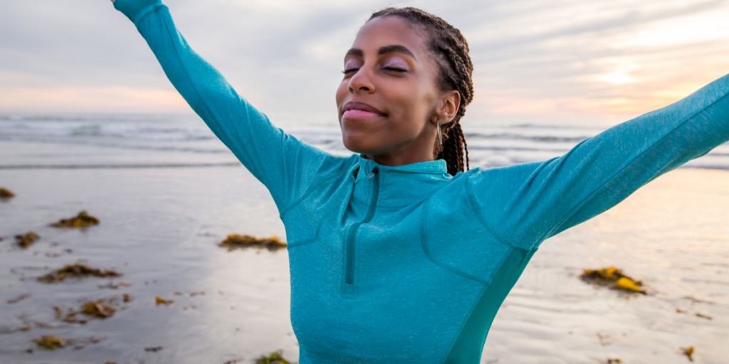 A female enjoying some quiet time on the beach while on her way to becoming a millionaire. 