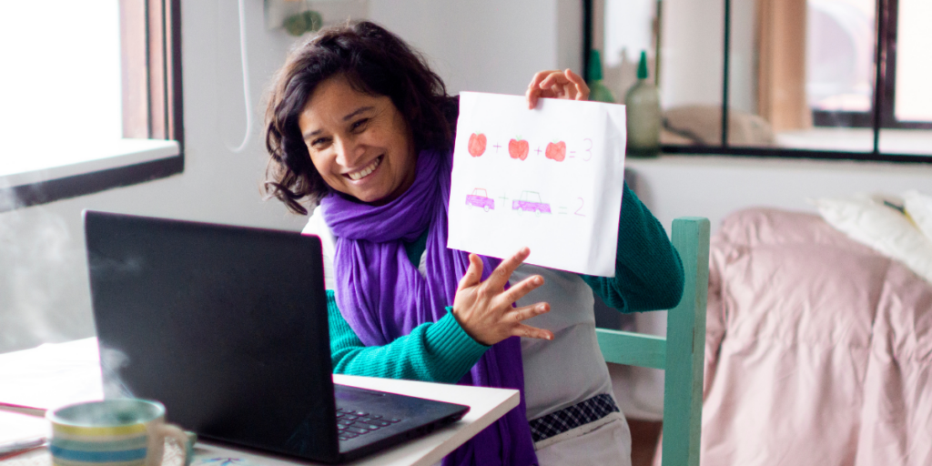 A lady teaching classes online as a side hustle job during the day. 