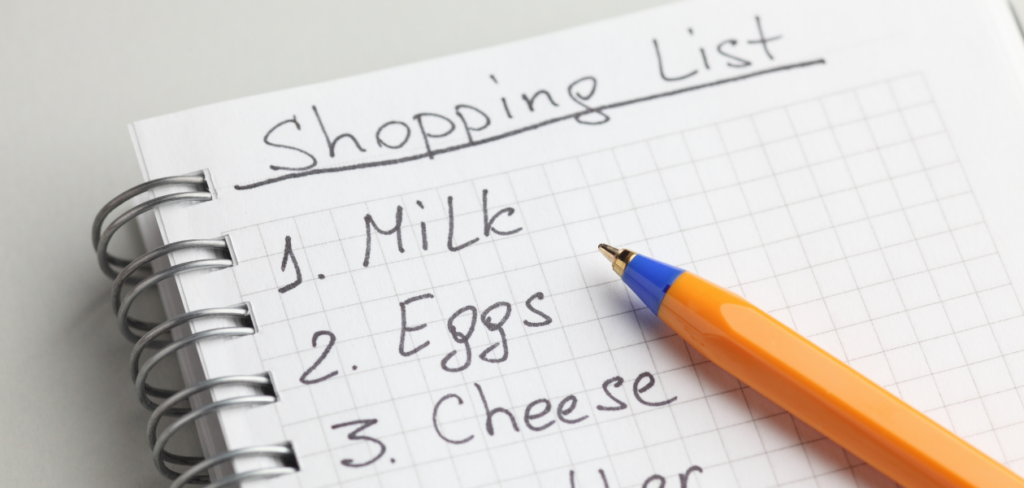 A shopping list and a yellow pen