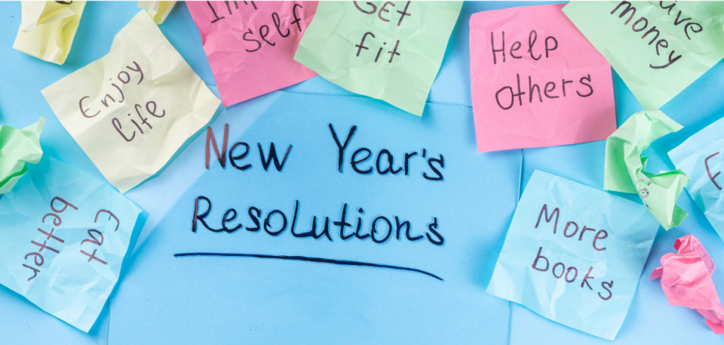 New year goals or resolutions on bright colorful papers.
