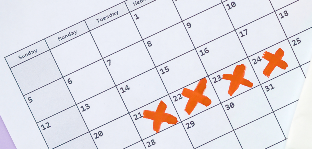 A calendar with red X marks.