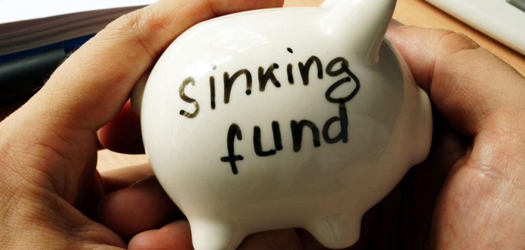 Piggy bank with sign sinking fund.