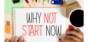 Overhead shot of a person's hands writing "WHY NOT START NOW" in a notebook. Office supplies, a coffee cup, and other items surround the notebook.
